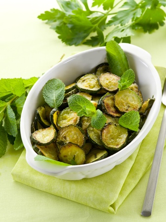 Sauteed zucchinis with mint leafの写真素材