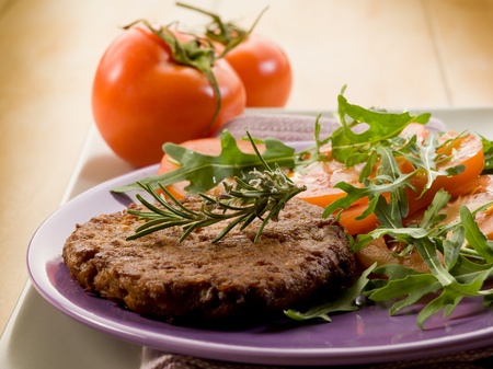 soy steak with arugula and tomatoes salad