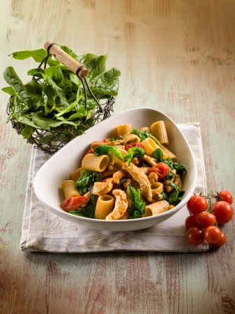 pasta with chicken  spinach and tomatoesの写真素材