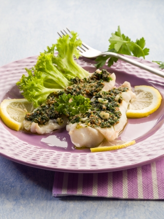 cod fillet with parsley anchovy and capersの写真素材