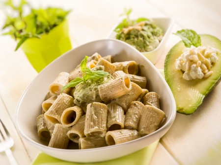 pasta with avocado mint and pine nuts pestoの写真素材