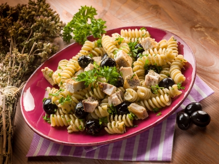 fusilli with swordfish and black olivesの写真素材