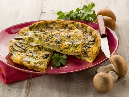 omelette with mushroom and parsleyの写真素材