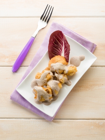fried cauliflower with cream sauceの写真素材