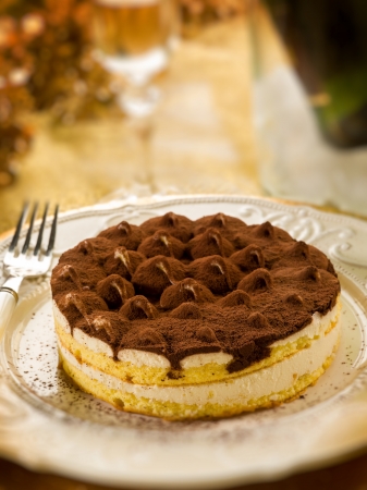 tiramisu over golden table, selective focusの写真素材
