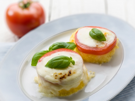 mozzarella tomatoes and porridge, selective focusの写真素材