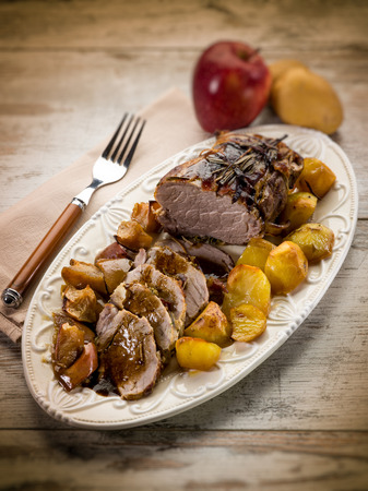 roast  with potatoes and apple,  selective focusの写真素材