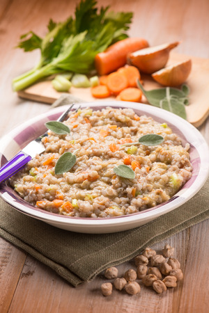 barley risotto with chickpeas and vegetables, selective focusの写真素材