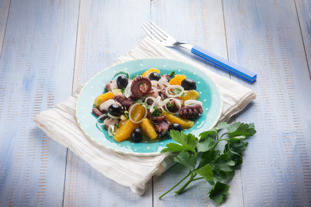 octopus salad with sliced orangeの写真素材