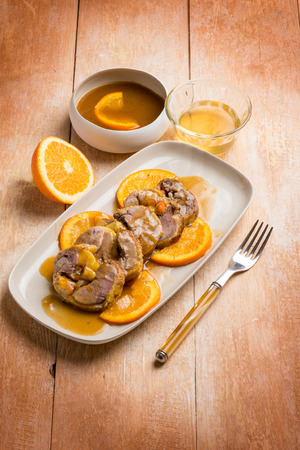 sliced duck with orange sauceの写真素材