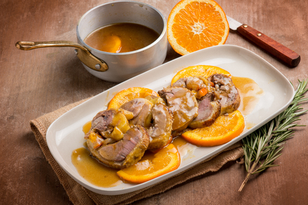 sliced duck with orange sauceの写真素材