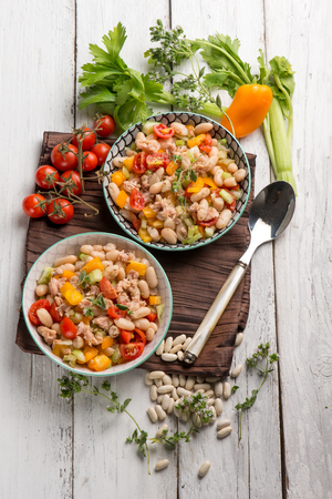 salad with tuna cannellini beans pepper and tomatoesの写真素材