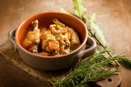 rabbit with carrot herb rosemary and laurelの写真素材