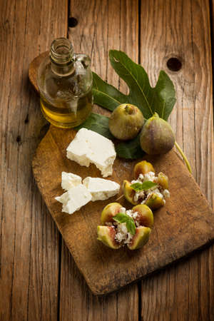 figs with feta cheese and olive oileの写真素材