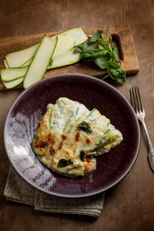 dish with parmigiana zucchinis vegetarian recipeの写真素材
