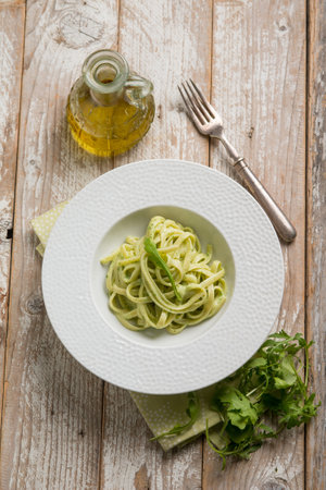 linguine pasta with arugula pestoの写真素材