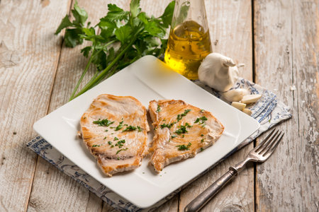 grilled swordfish with garlic and parsleyの写真素材