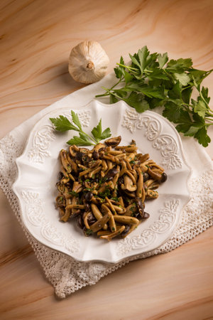 sautÃ©ed chiodini mushroom with parsley and garlicの写真素材
