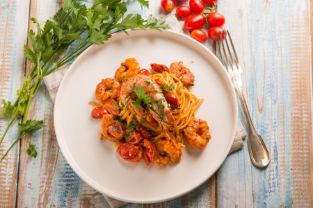 linguine with giant shrimp cherry tomatoes and parlseyの写真素材