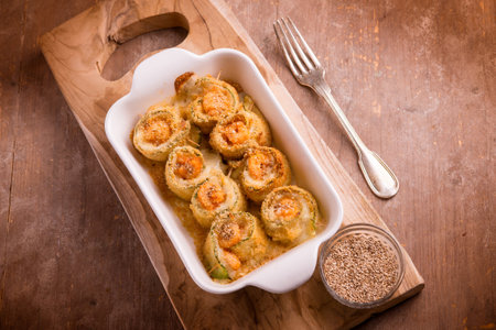 prawn zucchini rolls witn mozzarella and sesame seedsの写真素材