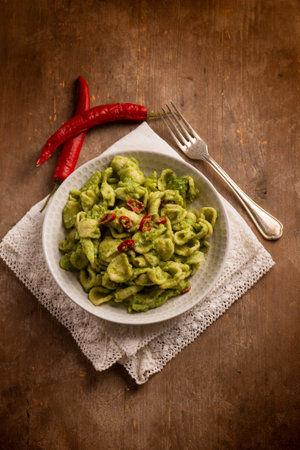 Orecchiette with broccoli and anchovies traditional Italian recipeの写真素材