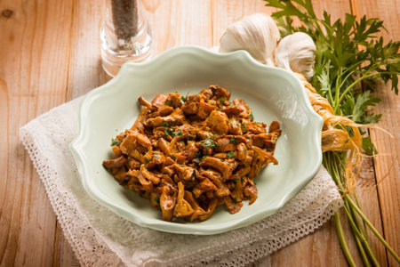 sautÃ©ed chanterelles mushroom with garlic and parsleyの写真素材