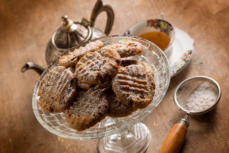 homemade chocolate cookies with cup of teaの写真素材