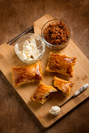 puff pastry filled with minced meat and cheeseの写真素材