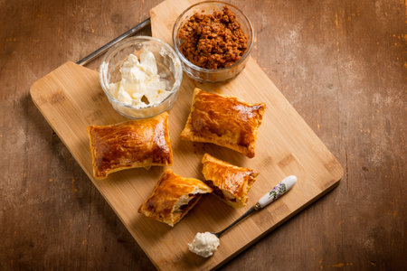puff pastry filled with minced meat and cheeseの写真素材