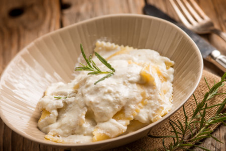 ravioli with parmesan cheese and herbsの写真素材