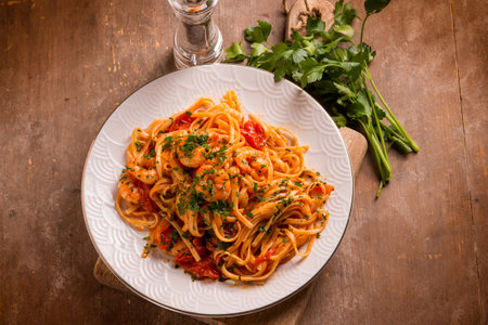 linguine with shrimp tomato sauce and parsleyの写真素材