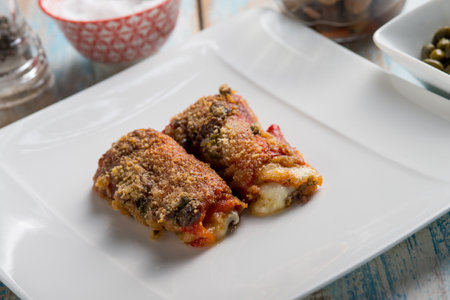 peppers rolls with mozzarella capsicum and black olivesの写真素材