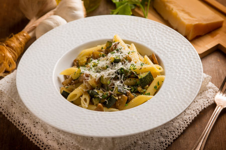 pasta with eggplants, zucchini and parmesan cheeseの写真素材