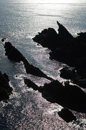 Coast in front of Galley Head lighthouse in Ireland.の写真素材