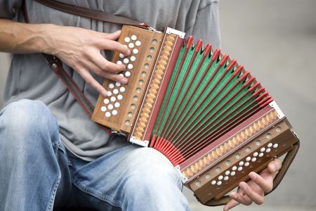 A guy playing an accordion in Switzerland.. の写真素材