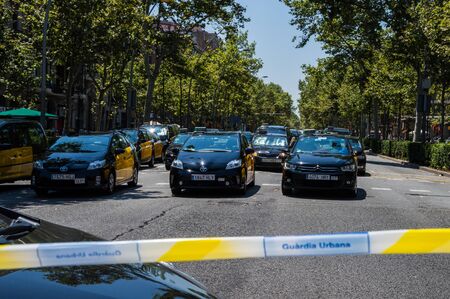 Barcelona, Catalonia / Spain - July 31 2918: taxi strike in Barcelona continues bloking the streetsのeditorial素材