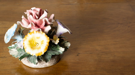 Ceramic Colorful Flowers on Wooden Tableの写真素材