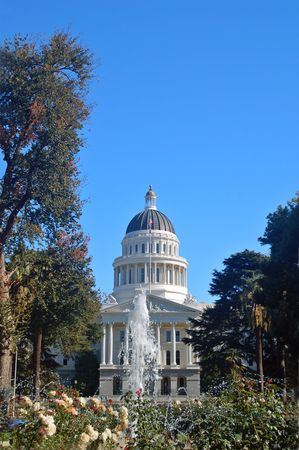 Capitol building in Sacramento with a fountain in front.の写真素材