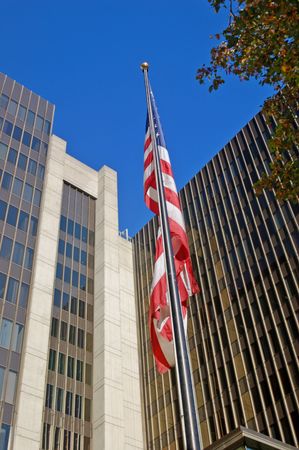 Flag in front of some corporate office buildings in downtown Sacramento, California