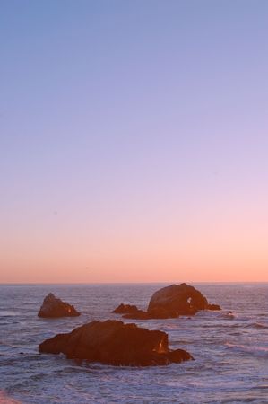 evening rocky shoreline in northern californiaの写真素材