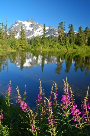 Mountain peak reflected on a lake in the North Cascade mountains of Washington Stateの写真素材