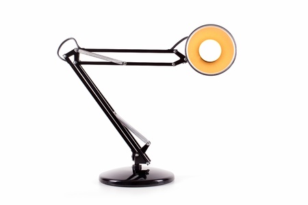 Vintage black desk lamp isolated on whiteの写真素材
