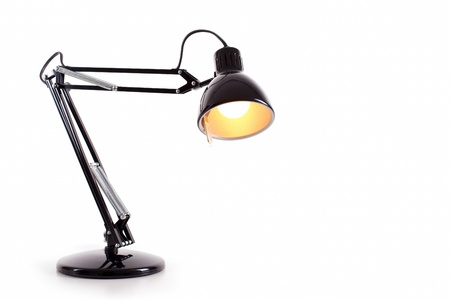 Vintage black desk lamp isolated on whiteの写真素材