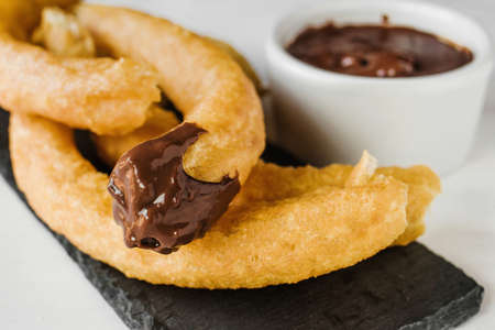 Churros or porras with Chocolate, traditional food in Catalunya Spainの写真素材