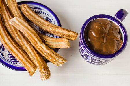 Churros with Chocolate in Mexico cityの写真素材