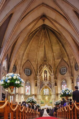 couple getting married in a beautiful gothic church