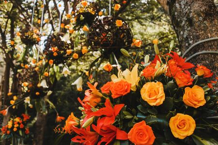 Bouquet of roses in color orange and yellow, bridal wedding bouquetの写真素材