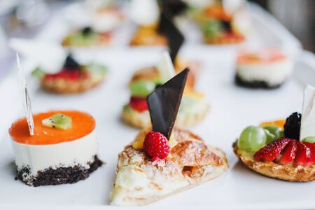 homemade tarts dessert, assorted desserts with fruitsの写真素材