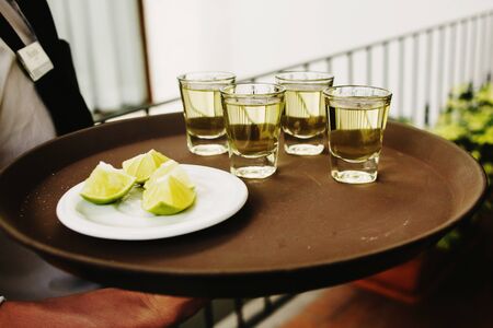 tequila shots and lemon, mexican drink in mexico cityの写真素材