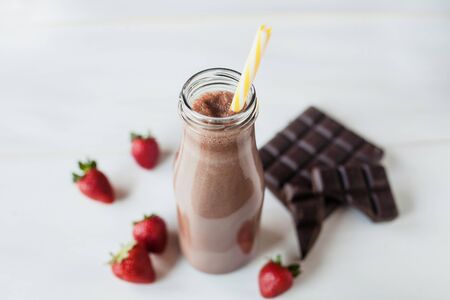 smoothie chocolate with strawberry or milkshakes, natural and organic drink in the glass jarの写真素材